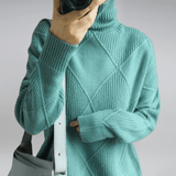 Women's Ribbed Oversized Panelled Turtleneck Sweater in Blue, on model